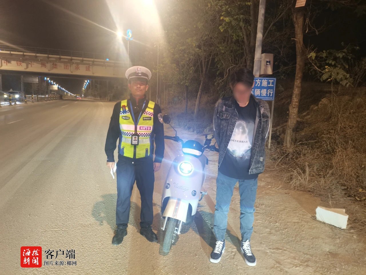 骑电动车误上高速公路 男子被三亚交警处罚